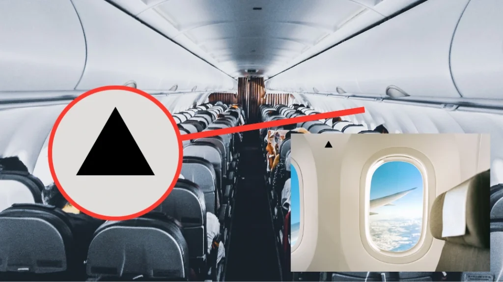 imagem do triângulo sinalizador da cabine de passageiros do avião